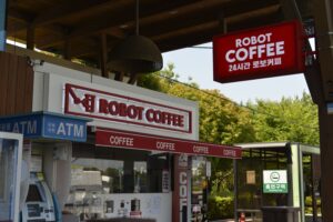 Coffee shop startup cost guide showing commercial espresso machine and cafe equipment in 2026