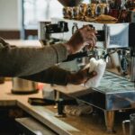new cafe owner planning coffee shop equipment and espresso machine setup