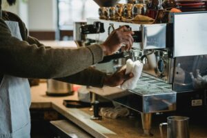 new cafe owner planning coffee shop equipment and espresso machine setup