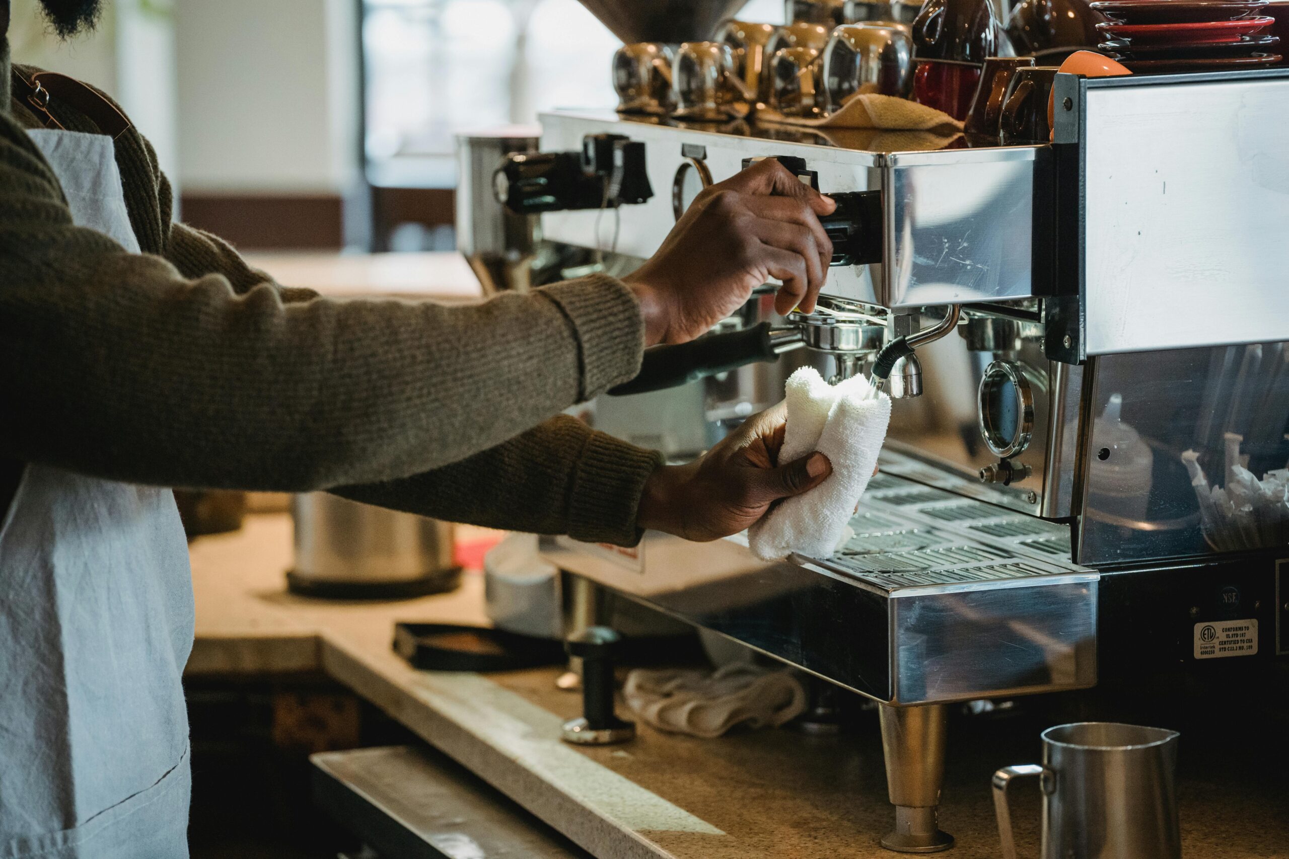 new cafe owner planning coffee shop equipment and espresso machine setup