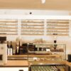 Commercial espresso grinder setup in a coffee shop showing professional coffee equipment for café owners